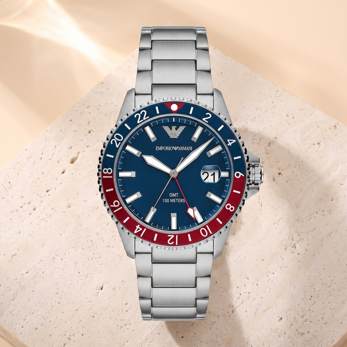 Montre Emporio Armani Cosmograph, fond travertin